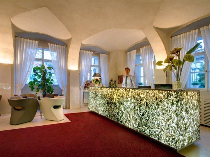 Отель Three Storks Прага Экстерьер фото Reception desk at the Hotel Axelmannstein
